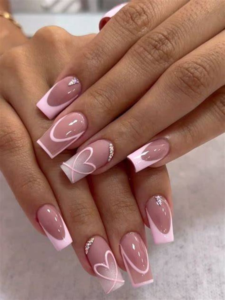 French Tips with Pink Hearts: A Trendy Nail Art Guide