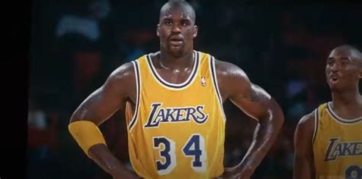 Shaq Breaking the Hoop: The Legend of Shaquille O'Neal's Dominance on the Court
