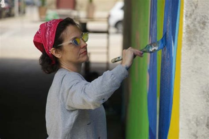 Swinging Bridge Paint Bank: A Colorful Journey Across the River