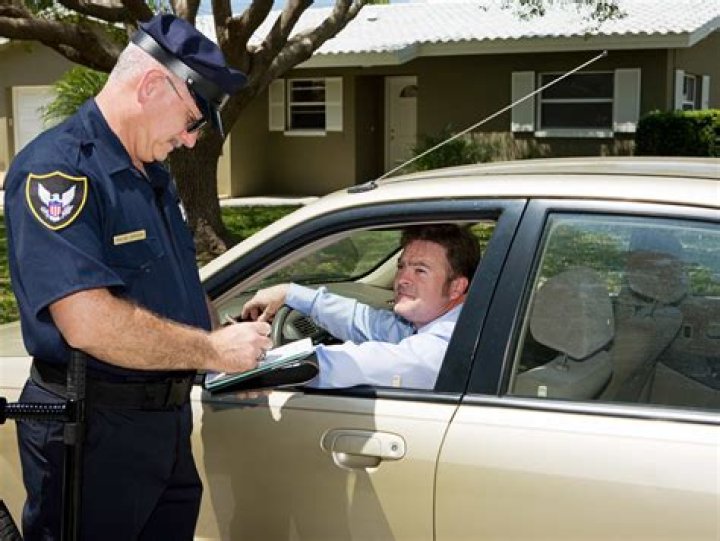 Why Do Cops Touch the Back of Cars? Understanding the Police Practice